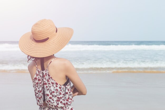 Caucasian woman or tourist from europe with happy and relax time on the tropical beach