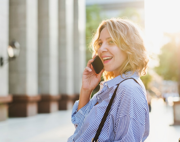 Caucasian woman with a smartphone