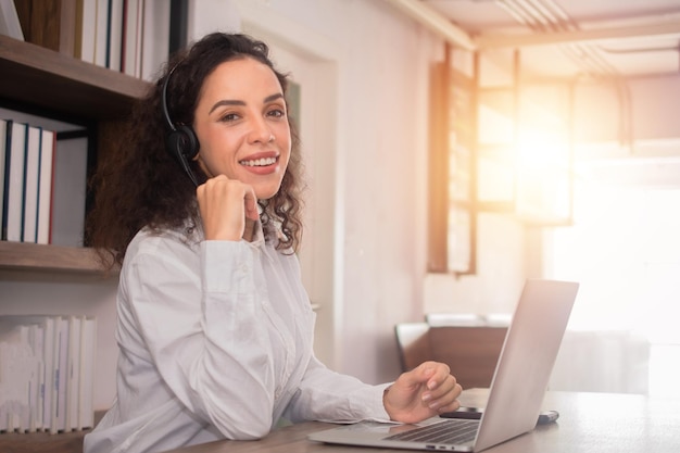 Caucasian woman working online call center support and service customer