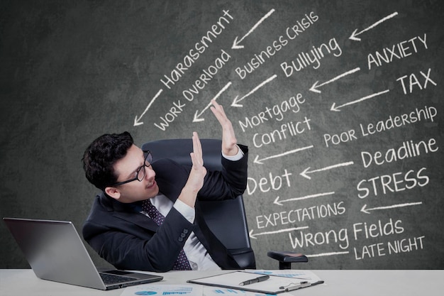 Caucasian worker facing problems in office