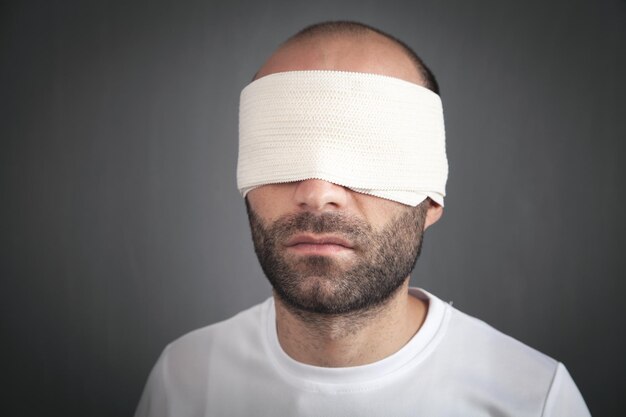 Blindfolded man Stock Photos - Page 1 : Masterfile