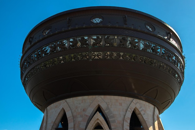 Cauldron family center on the blue sky background closeup with view point on the top