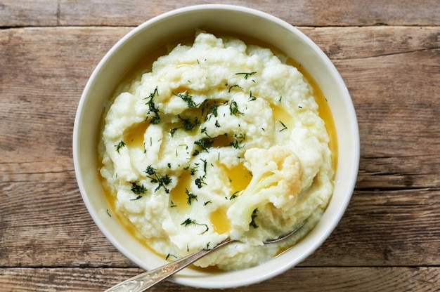 Cauliflower puree with butter and fresh herbs