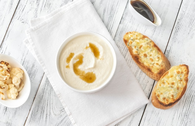 Cauliflower soup with brown butter and cheesy toasts