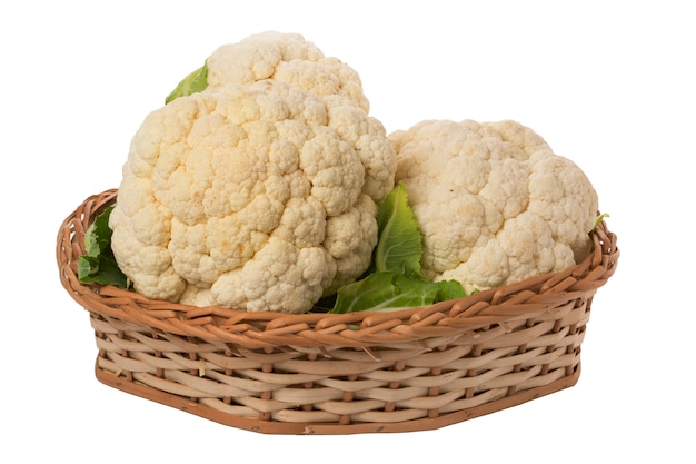 Cauliflowers in wicker basket on white background