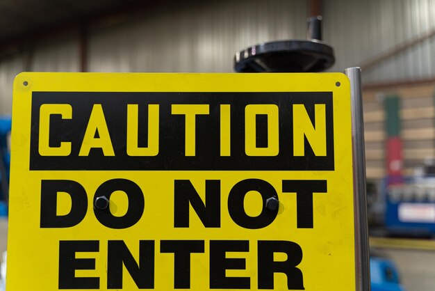 Caution do not enter sign on factory shop floor