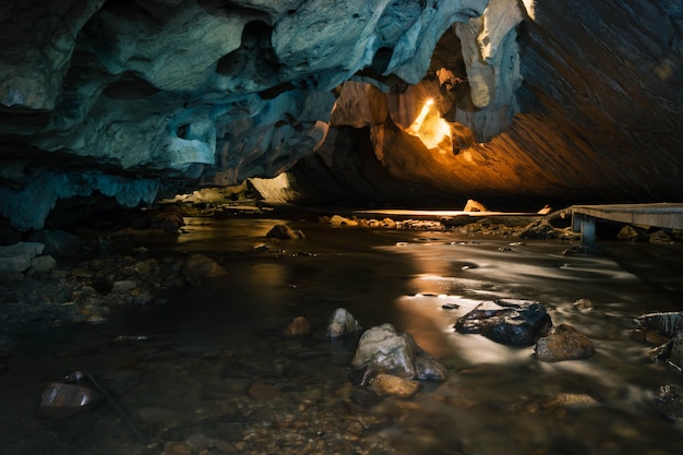 Cave passage with beautiful Stalactites in Thailand (Tanlodnoi cave)