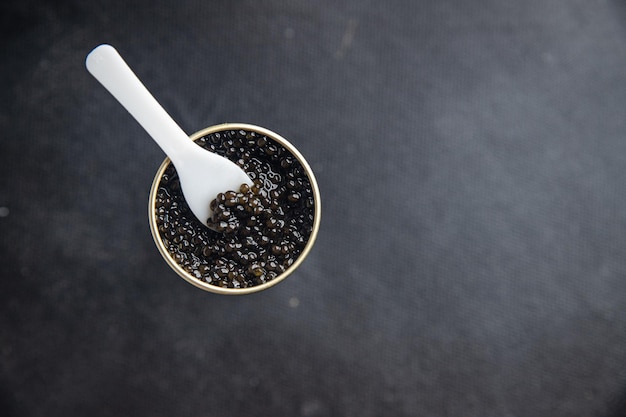 caviar black sturgeon fish beluga, stellate sturgeon fresh healthy meal food snack on the table