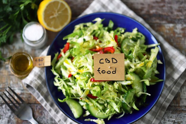 CBD salad with fresh cabbage, herbs and cucumber.