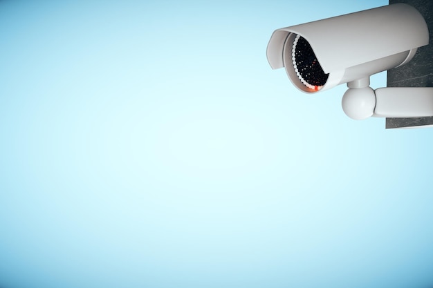 CCTV camera on blue background