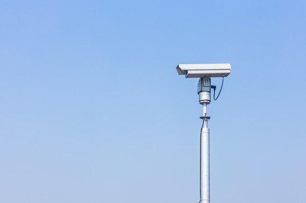 CCTV camera on blue sky