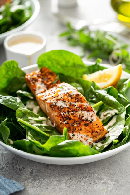 Cedar plank roasted salmon with spinach