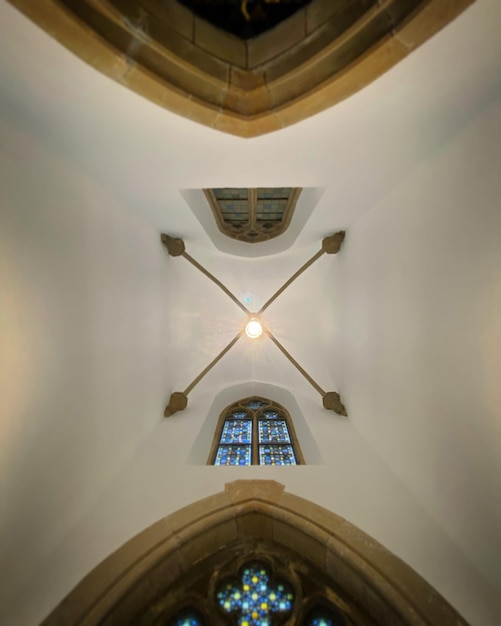 A ceiling with a cross on it that says " the word " on it.