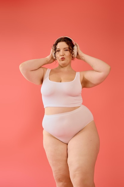 celebrating beauty and confidence in a vibrant setting with a stylish plus size woman