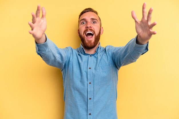 Celebrating a victory or success he is surprised and shocked