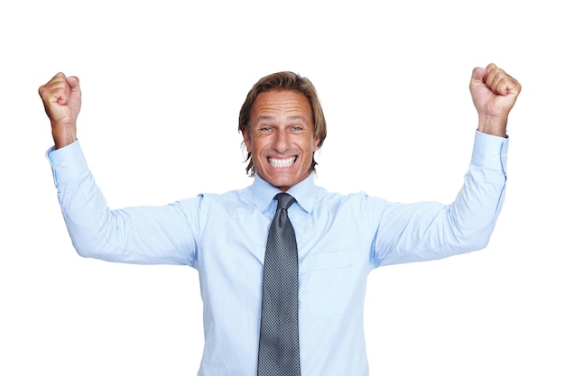 Celebration fists and portrait of a businessman in studio excited about a job promotion or good news Winning celebrate and corporate male model celebrating achievement isolated by white background