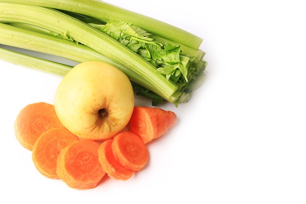 Celery carrot apple isolated on white background