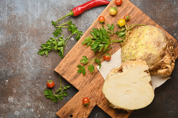 Celery root on wooden cutting board