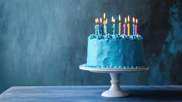 A Celestial Masterpiece A Majestic Blue Birthday Cake Illuminated With the Radiance of Lit Candles