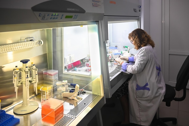 Cell culture researcher in the laboratory