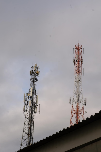 A cell phone tower with a few other cell phones on it.