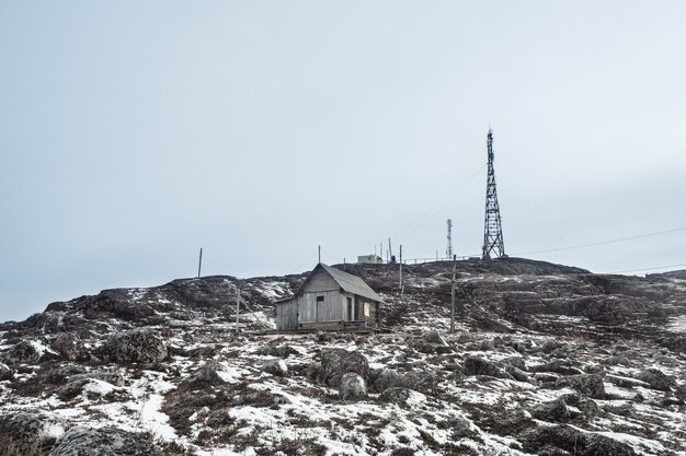 Cell towers in the snowcovered hills in tundra