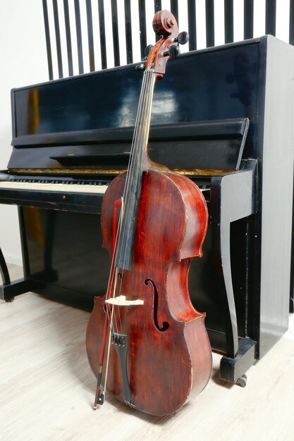 Cello near piano indoors