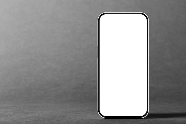 Cellphone phone on the gray backgrounds for advertisement back to school