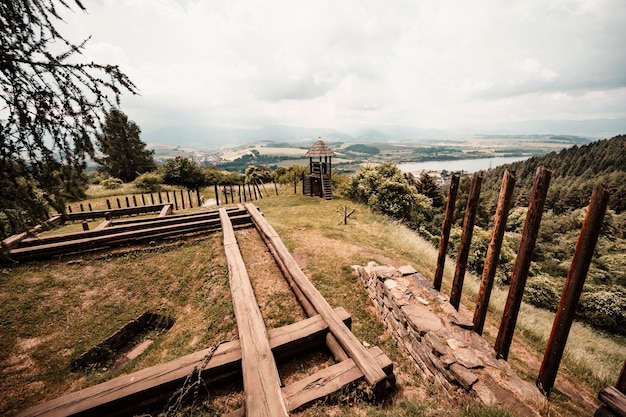 Celtic settlement construction in the archaeological locality Havranok Ancient celtic fortress near Liptovska Mara Liptov region Slovakia landscape