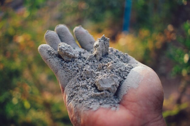Cement dust in hand