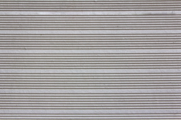 Cement gray horizontal straight lines texture. Pattern. Background.