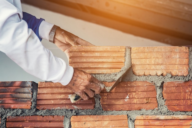 Photo cement masons and plasterer, brick for building