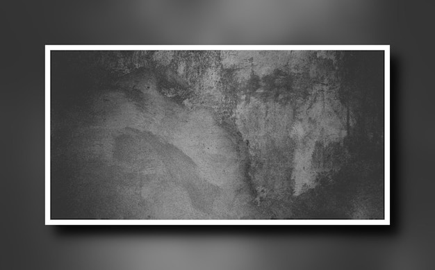 Cement photo inside white frame on dark concrete wall