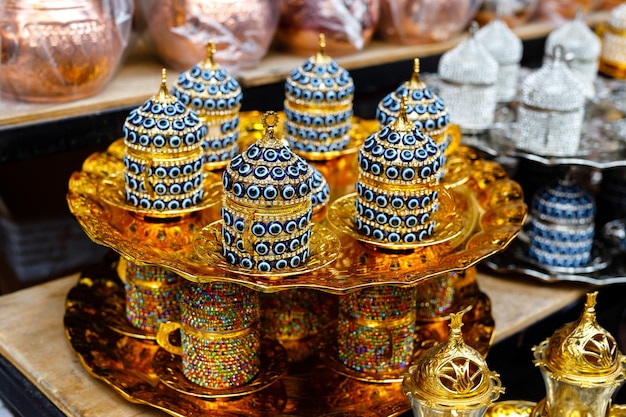 Ceramic bowls with traditional Turkish ornaments are sold at a street market