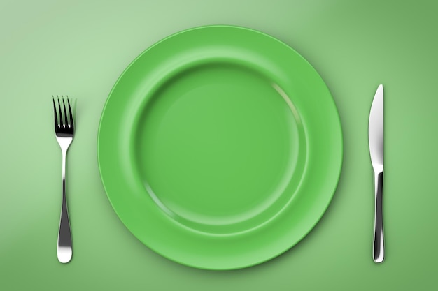 Foto piatto vuoto in ceramica coltello e forchetta stile verde vista dall'alto