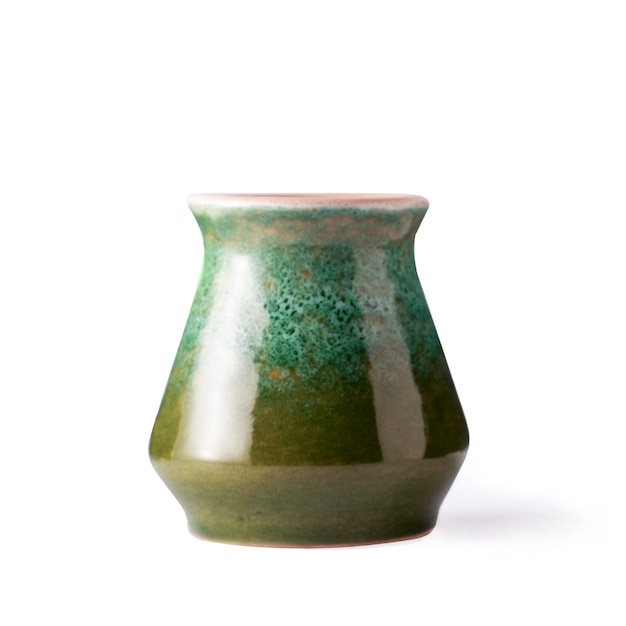 Ceramic green vase on a white isolated background.