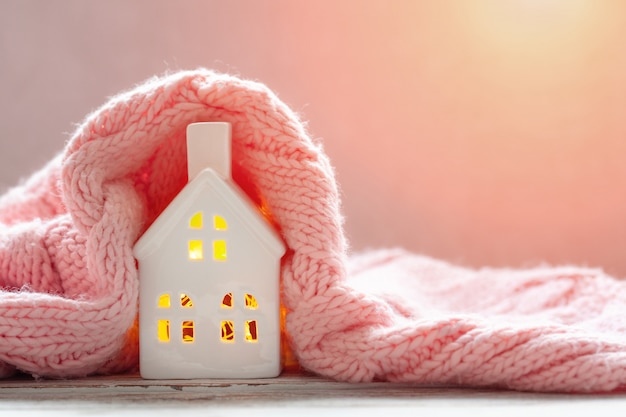 Photo ceramic house with warm pink plaid