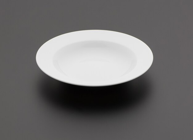 ceramic kitchen plate on black background