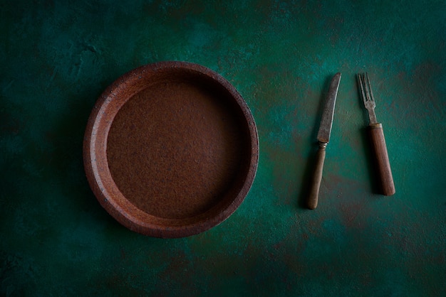 Ceramic tableware pottery plate on grungy