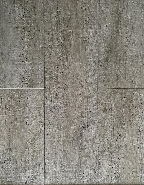 Foto piastrelle di ceramica sul pavimento vista dall'alto struttura in legno colore grigio adatto per sfondo texture