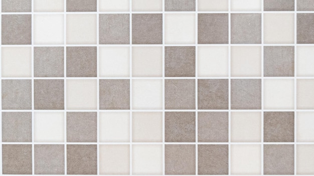 Ceramic tiles patterns from mosaic brown tile sand background