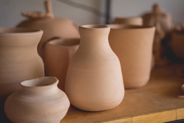 Ceramic vase on the table at the workshop