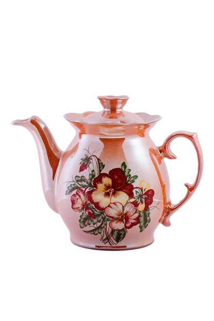 Photo ceramic vintage brown teapot with flower pattern isolated on white background. copy space.