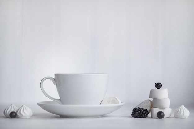 Ceramic white cup with hot coffee