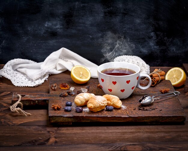 Ceramic white cup with hot tea