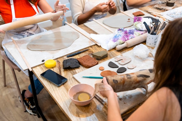 Ceramic Workshop Work table with different types of ceramic clay