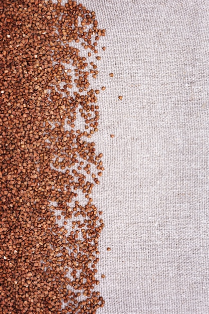 Cereal Buckwheat close up as background with copy space