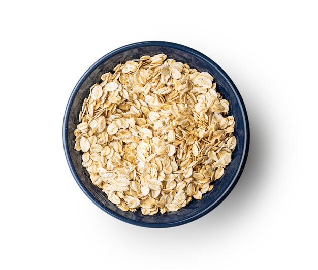 Cereal oatmeal in bowl isolated on white background