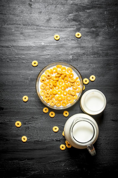 Cereal with milk in a glass dish.