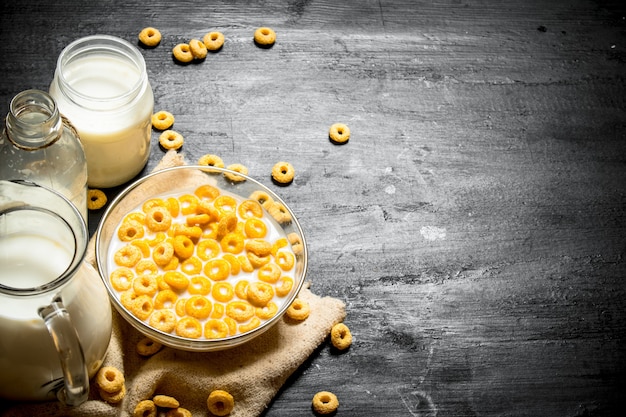 Cereal with milk in a glass dish.